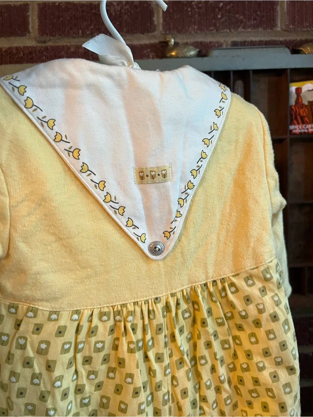 Lullaby Club Yellow Tulip Collar Baby onesie. Double layered